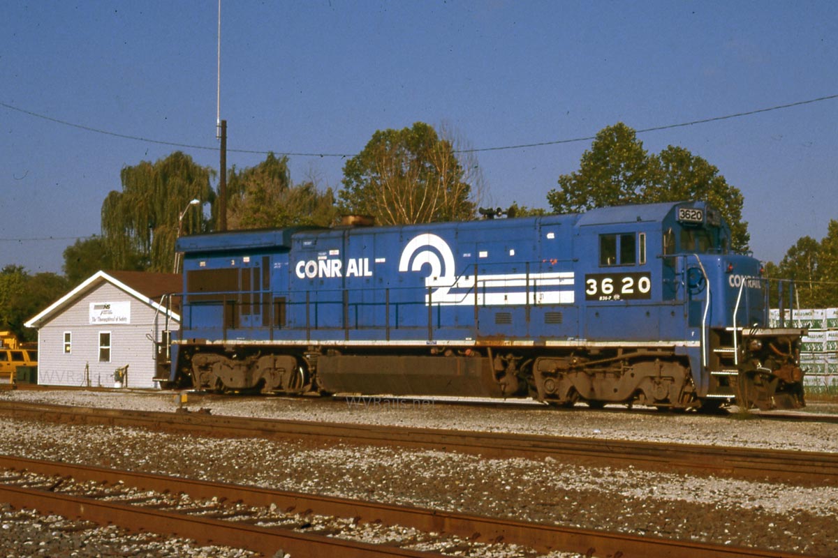 Conrail locomotive with the yard office in the background